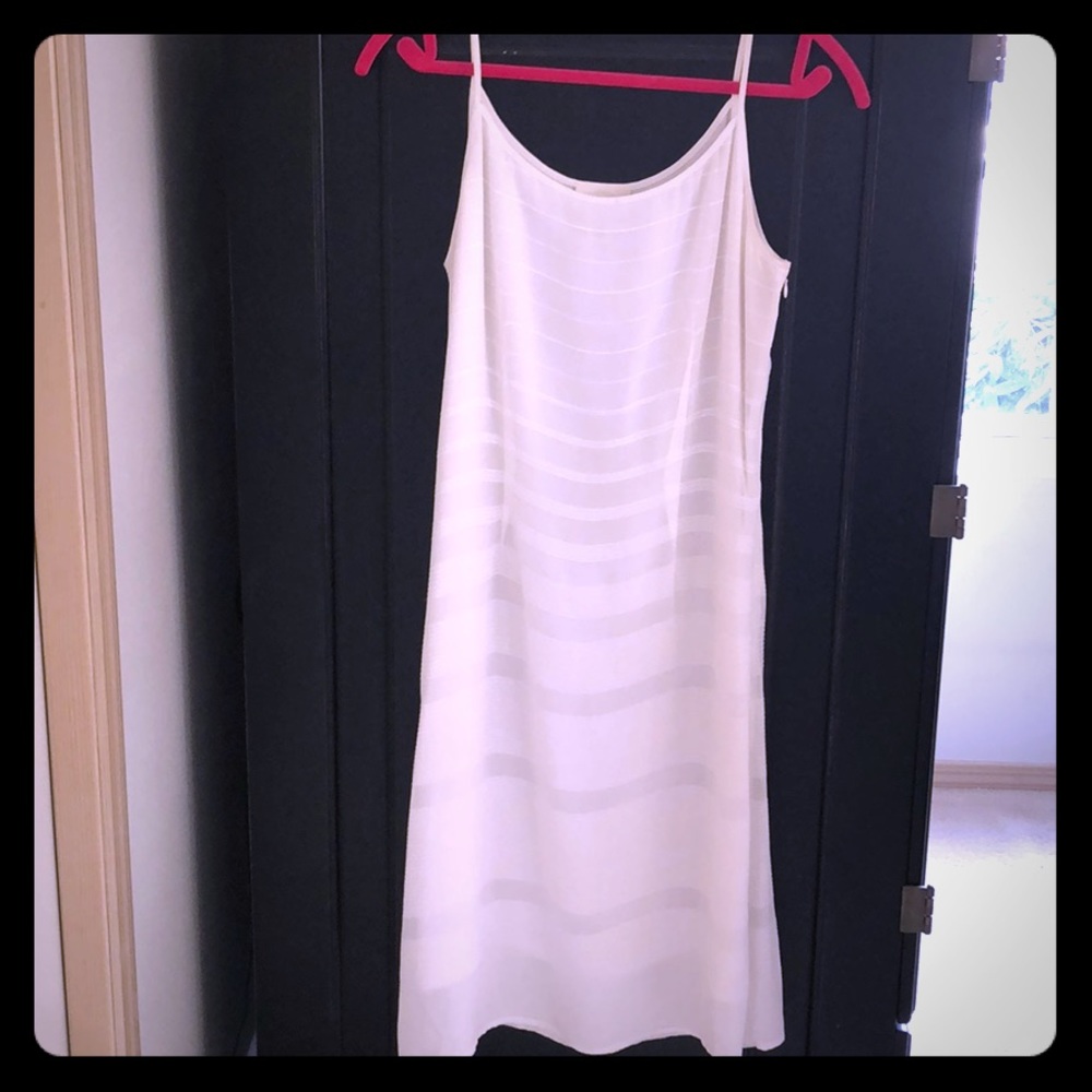 White knee-length dress.